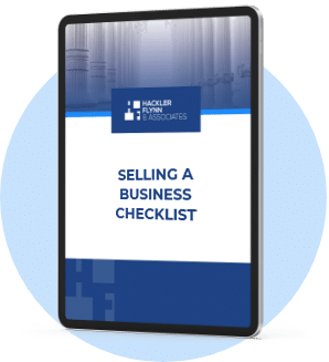 a tablet says, "Selling a Business Checklist"